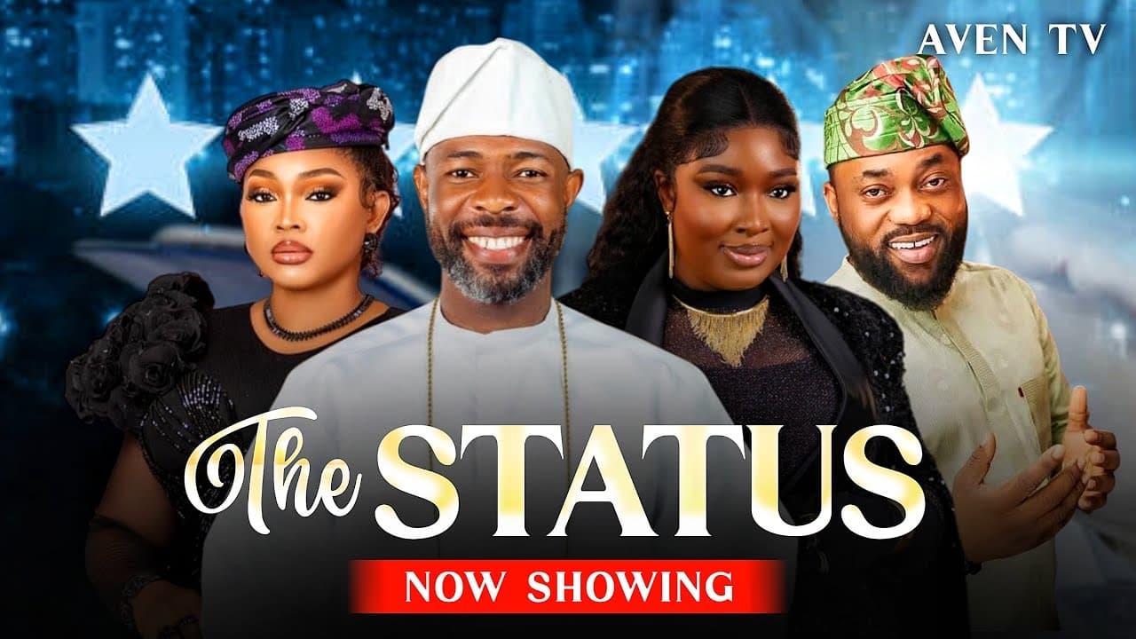 THE STATUS